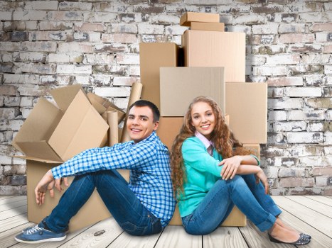 Professional movers handling furniture during a same day move