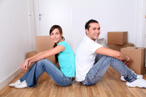 Professional team handling office furniture during a local relocation