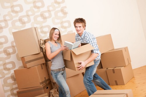 Unpacking boxes in a new Walthamstow home with organised placement