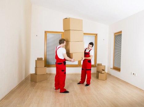 Professional movers loading furniture and boxes during a Walthamstow relocation