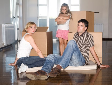Protective wrapping and moving equipment used for a piano relocation