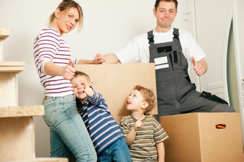 Specialist movers handling a grand piano move